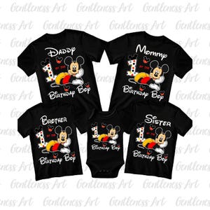 May include: A set of three ceramic mugs with a speckled, cream-colored glaze. Each mug features a different hand-painted floral design in shades of blue, green, and yellow. The mugs have a simple, rounded shape and a comfortable handle.