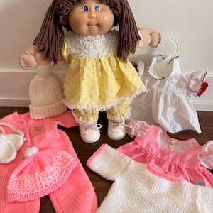 May include: A weathered wooden sign, inscribed with "Welcome to our porch" in white. The sign has a distressed appearance, ideal for adding a touch of rustic charm to a porch or garden.