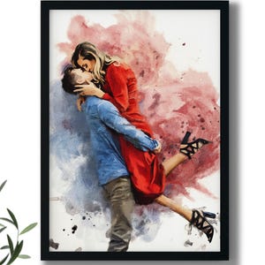 May include: A framed watercolour painting shows a couple embracing. The woman is in a red dress and black heels, held by a man in a blue shirt. The background has red and blue watercolour splashes.