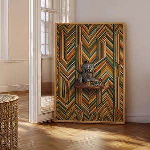May include: A large framed artwork with a geometric pattern in orange, green, and brown. A small espresso machine and accessories are on a wooden shelf attached to the artwork. The room has wooden flooring and a wicker table.