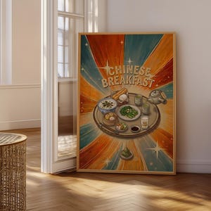 May include: A framed poster with the words "Chinese Breakfast" in a retro style. The artwork features a circular tray with various breakfast foods, including dumplings, vegetables, and tea. The background has a burst of orange, blue, and red colors.