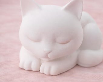 Candelabro de gato durmiendo