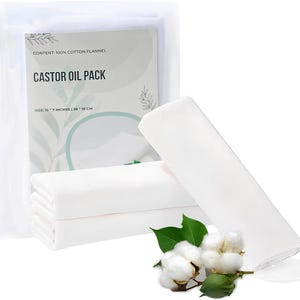 May include: A castor oil pack set featuring white cotton flannel fabric. The packaging displays the text "CONTENT: 100% COTTON FLANNEL", "CASTOR OIL PACK", and "SIZE: 15 * 7 INCHES | 38 * 18 CM". A sprig of raw cotton with green leaves is included.