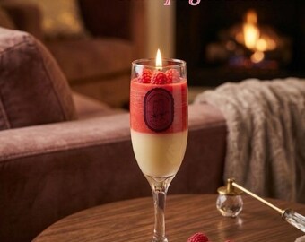 Mimosa de medianoche, copa de champán de lujo, vela de postre, frambuesas y crema.