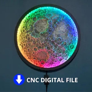 May include: Circular wall art showing a detailed depiction of the moon, with a colourful LED border. The image includes the text "CNC DIGITAL FILE". The moon's surface is textured. The piece is designed for wall mounting.