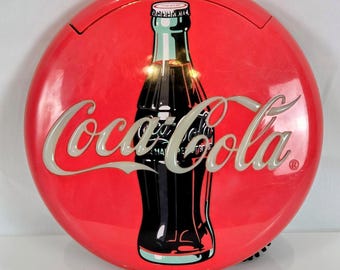 Retro Coca Cola 1995 12 tums lysande rund röd knappskylt och telefondelar