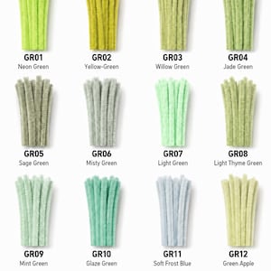 May include: Twelve bundles of fuzzy pipe cleaners arranged in a grid, labeled GR01 Neon Green, GR02 Yellow-Green, GR03 Willow Green, GR04 Jade Green, GR05 Sage Green, GR06 Misty Green, GR07 Light Green, GR08 Light Thyme Green, GR09 Mint Green, GR10 Glaze Green, GR11 Soft Frost Blue, and GR12 Green Apple.