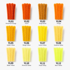 May include: Twelve bundles of fuzzy pipe cleaners arranged in a grid, labeled YL01 through YL12 with color names including Persimmon Orange, Carrot, Ginger Bread, Orange, Golden Yellow, Mango Yellow, Lemon Yellow, Gardenia Yellow, Butter Yellow, Primrose Yellow, Pastel Yellow, and Neon Yellow.
