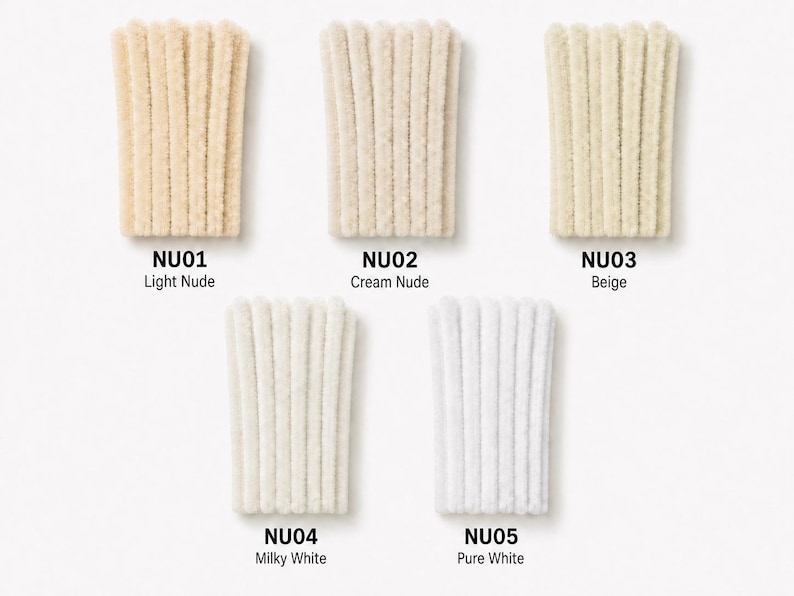 May include: Five bundles of fuzzy pipe cleaners arranged in a grid. Each bundle is labeled with a code and color name: NU01 Light Nude, NU02 Cream Nude, NU03 Beige, NU04 Milky White, and NU05 Pure White. The textures are soft and fibrous.