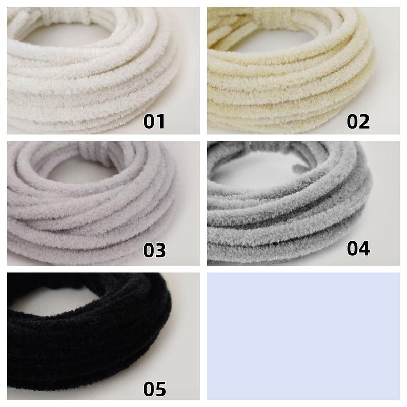 May include: Five coiled plush headbands in a range of colours: white, cream, light grey, dark grey, and black. Each headband is shown against a white background, with a number label on each.