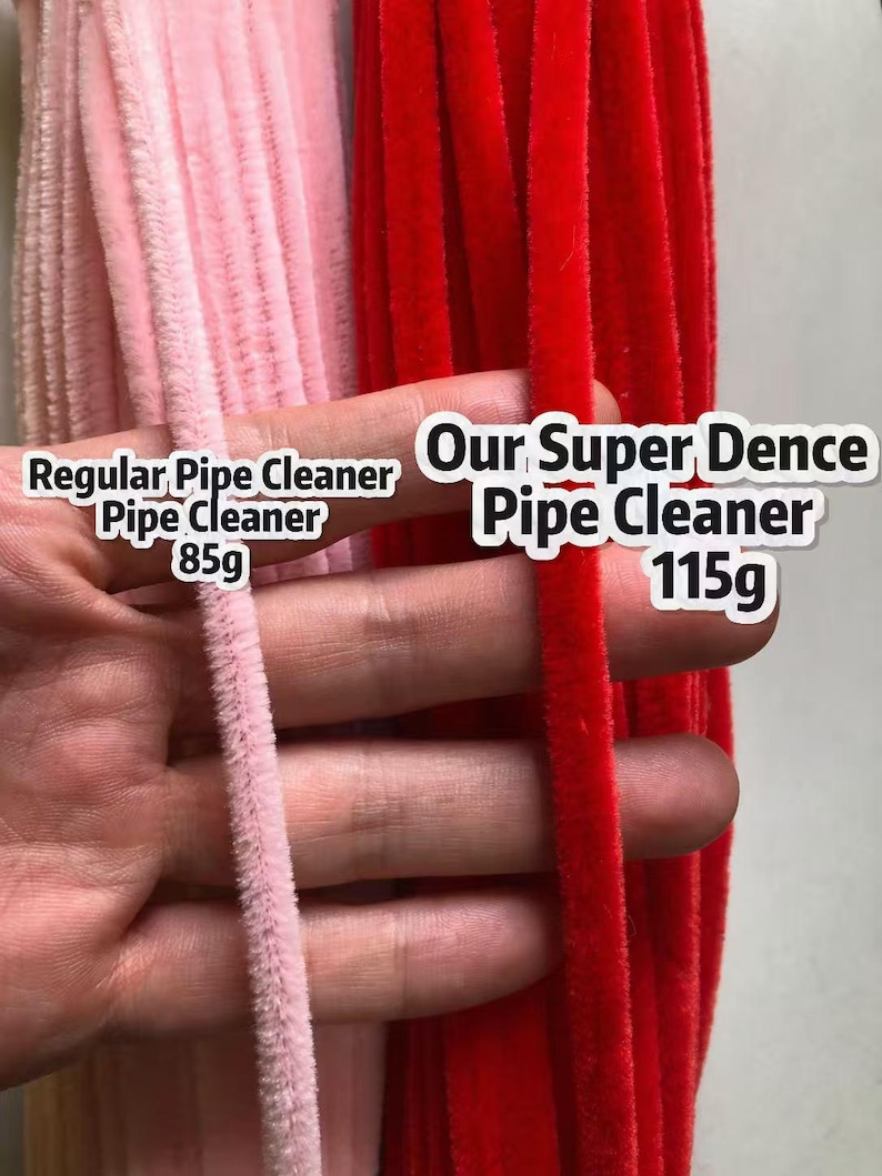 May include: A comparison of two pipe cleaners: a light pink version labeled Regular Pipe Cleaner 85g and a vibrant red version labeled Our Super Dence Pipe Cleaner 115g. The image highlights the difference in texture and density between the two items.