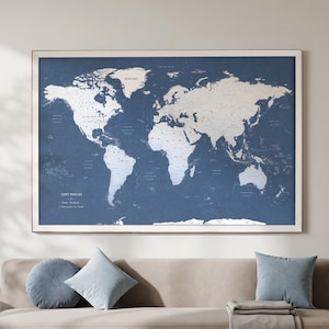 May include: A rectangular wall map featuring a dark blue background with white landmasses and text. The map displays global geography with the title Quiet Passages and two legend entries labelled Paths Walked and Memories to Seek, all framed in a thin white border.