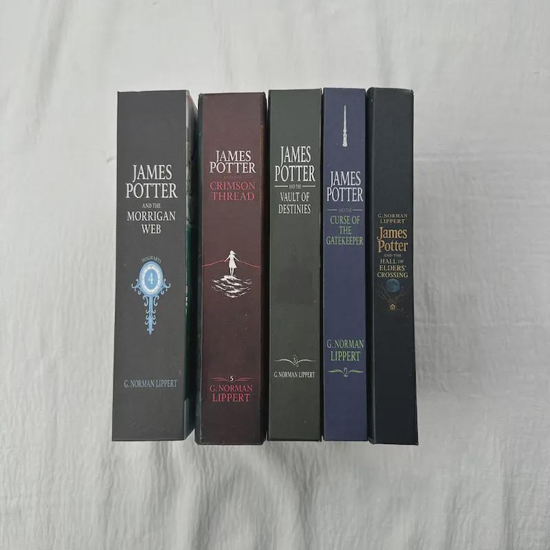 May include: A collection of hardcover books with titles including "James Potter and the Morrigan Web" and "James Potter and the Hall of Elders Crossing." The spines are various colors, with the author's name at the bottom.