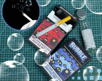 Cigarrillo de burbujas de juguete, juguete novedoso y divertido, accesorio para dejar de fumar, soplador de burbujas de juguete PLA, dispositivo para dejar de fumar, juguete para fiestas, regalo de broma para fumadores