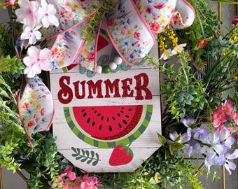 Hello Summer sign with a lot of wildflowers and Greenery on a wire form.