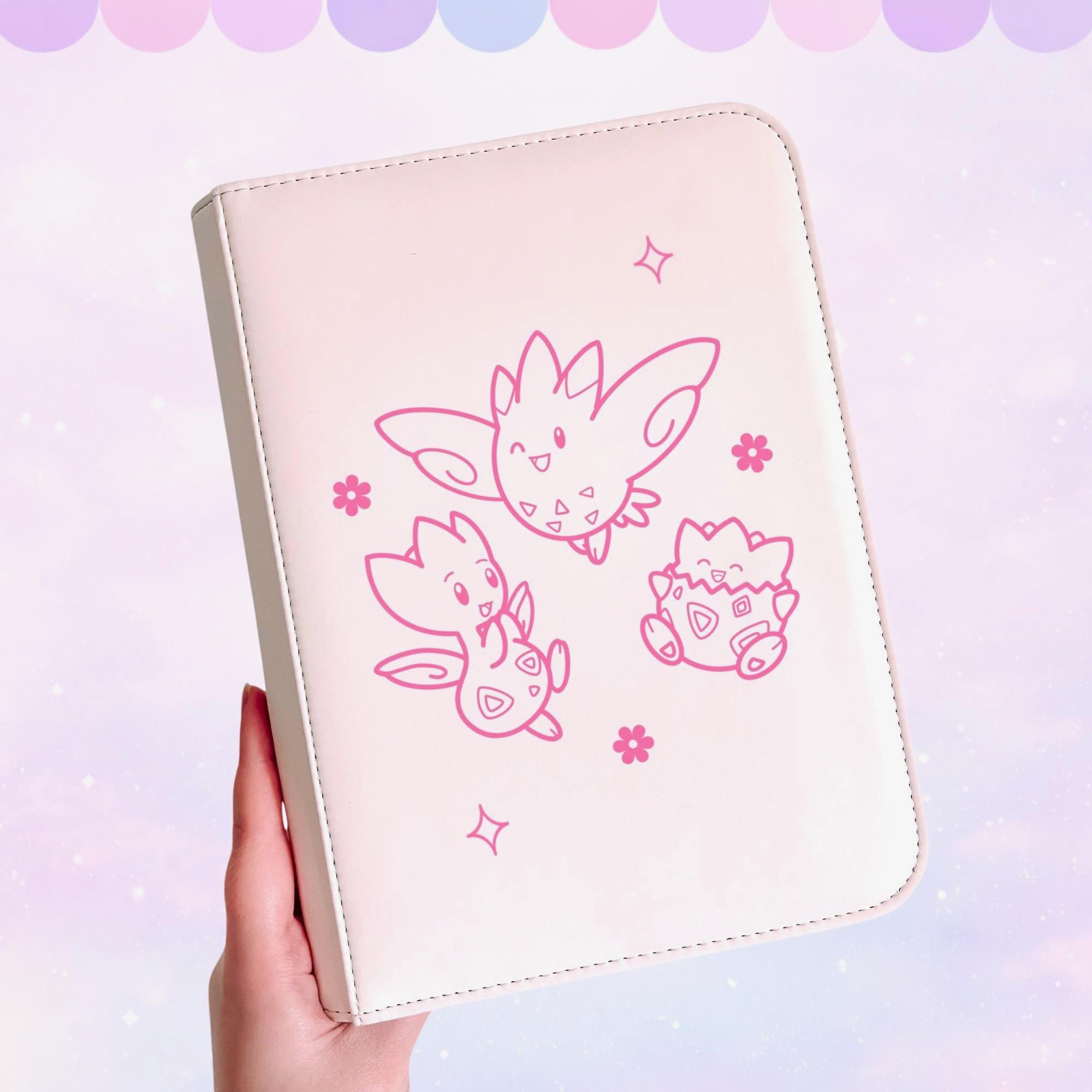 togepi pokemon card binder Holiday Bundle for Pokmon Ultra PRO International while also featuring a charming design with the beloved Togepi Ruley711's Togepi & Jirachi Collection
