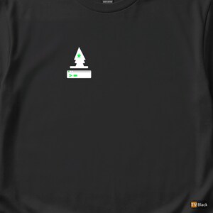May include: Black t-shirt featuring a white and green graphic of a Christmas tree and a command prompt. The tree has a star on top. The command prompt has a green arrow and a green line.