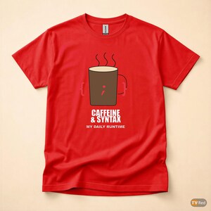 May include: Red t-shirt with a coffee mug graphic. The mug is brown with steam rising, and a semicolon inside. The text reads "CAFFEINE & SYNTAX" and "MY DAILY RUNTIME" in white.
