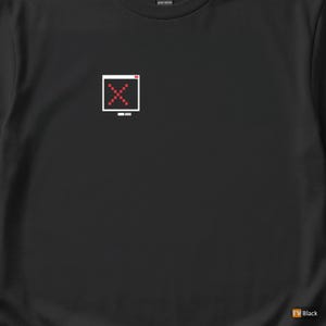 May include: Black t-shirt featuring a pixelated computer screen graphic with a red 'X' inside. The design is centered on the chest. The shirt is made of a heavy cotton material.
