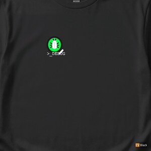 May include: Black t-shirt featuring a green and white graphic of a bug inside a circle, with the text "_DEBUG" below. The shirt is made of a heavy cotton material.