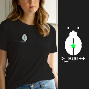 May include: A black short-sleeved t-shirt featuring a white graphic of a beetle on the left chest. The beetle design includes a bright green star in the center and the white text >_BUG++ printed directly underneath the insect illustration.