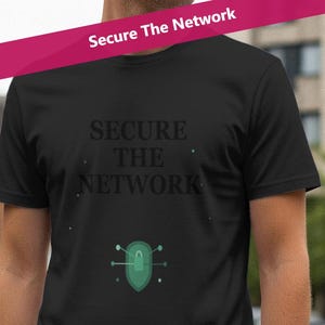 May include: Black t-shirt with the text "SECURE THE NETWORK" in a dark font. Below the text is a green shield graphic with a network design. A pink banner with the text "Secure The Network" is across the top of the image.