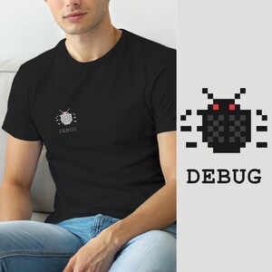 May include: A black short-sleeved t-shirt featuring a small pixel art graphic on the left chest. The graphic depicts a dark gray beetle with red eyes and the word DEBUG printed in a simple, sans-serif font directly underneath the insect icon.