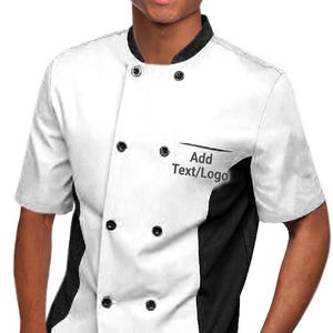 May include: A white and black chef's coat with short sleeves and black buttons. The coat has a black collar and black panels on the sides. The text "Add Text/Logo" is printed on the chest pocket.