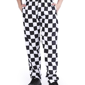 May include: Full-length trousers featuring a bold black and white checkered pattern. These pants have an elasticized waistband and two side pockets, providing a relaxed fit with a consistent grid design throughout the fabric.