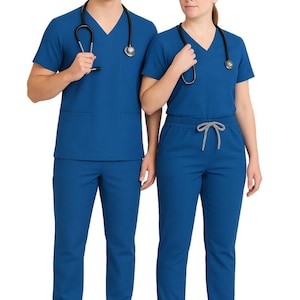May include: Two people wearing matching blue medical scrubs. The scrubs include a V-neck top with pockets and matching pants. Both are wearing white sneakers and have a stethoscope around their necks. The scrubs are a solid, vibrant blue color.