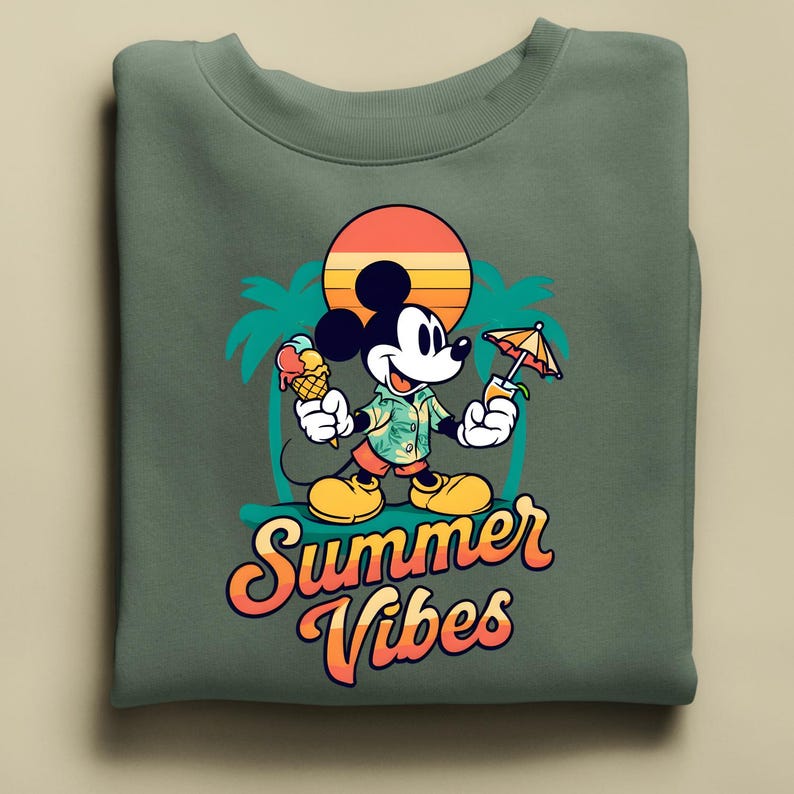 May include: Green sweatshirt featuring a cartoon Mickey Mouse holding an ice cream cone and a tropical drink. The design includes a sunset, palm trees, and the words "Summer Vibes" in orange and yellow.