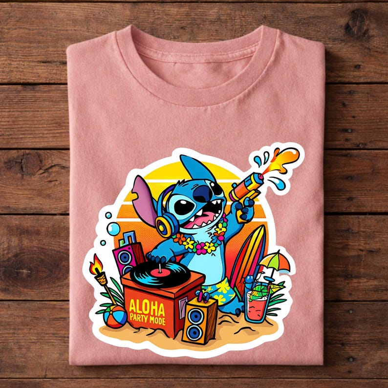 May include: A light pink t-shirt featuring a cartoon character, Stitch, holding a water gun. The design includes a turntable, surfboard, and the text "ALOHA PARTY MODE". The background has a sunset design.