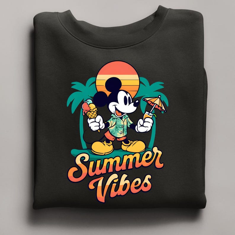 May include: Black sweatshirt featuring a cartoon Mickey Mouse holding an ice cream cone and a tropical drink. The design includes a sunset, palm trees, and the words "Summer Vibes" in orange and yellow.