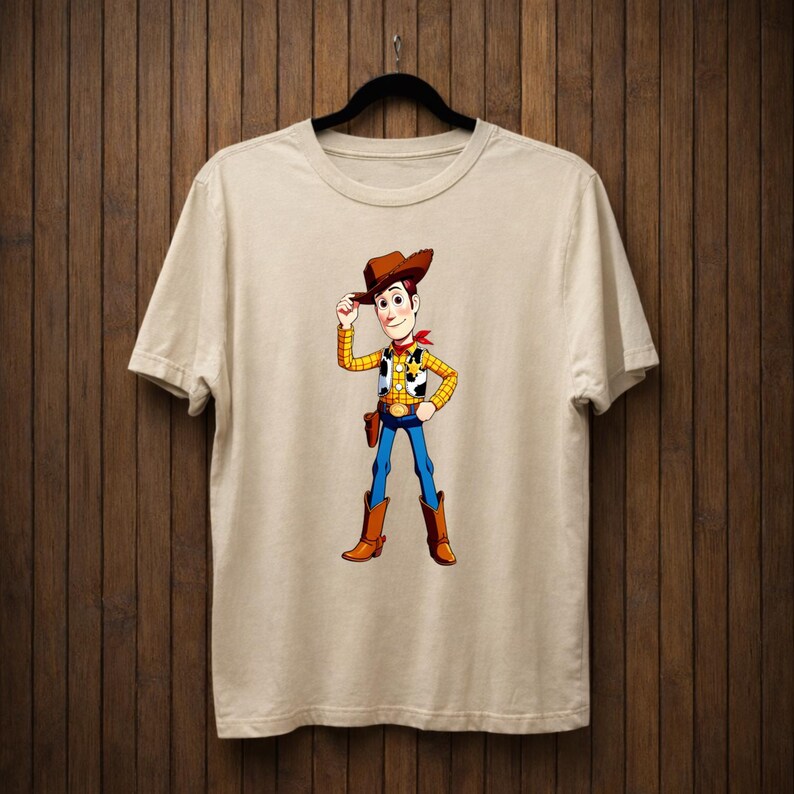 May include: A white ceramic mug with a black handle and the text "But First, Coffee" in a black, handwritten-style font. The mug is on a white surface.