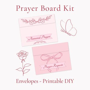 May include: A Prayer Board Kit featuring two light pink envelopes with dark pink line art. One envelope is labeled Answered Prayers with floral accents, and the other is labeled Prayer Requests with a bow. A rose and a butterfly are also depicted.