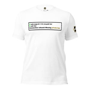May include: A white short-sleeved t-shirt featuring a black rectangular graphic on the chest with green terminal command text reading ssh-copy-id -i id_rsa.pub her, ssh her, and Connection refused: Missing private key in black and gold text.