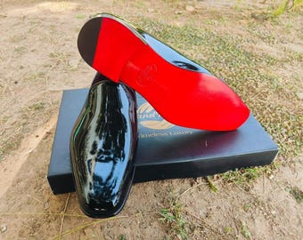 Christian Louboutin-loafers för kvinnor: Röda lackskor i läder