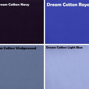 May include: A grid of four fabric swatches labelled Dream Cotton Navy, Dream Cotton Royal, Dream Cotton Wedgewood, and Dream Cotton Light Blue. Each square displays a solid colour variation ranging from deep dark blue to a soft light blue shade.