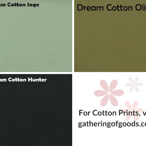 May include: A grid of three solid fabric swatches labelled Dream Cotton Sage in light green, Dream Cotton Olive in dark olive green, and Dream Cotton Hunter in black. The bottom right corner features pink flower icons and the text For Cotton Prints, visit gatheringofgoods.com.