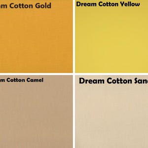 May include: A grid of four fabric swatches labelled Dream Cotton Gold, Dream Cotton Yellow, Dream Cotton Camel, and Dream Cotton Sand. Each square displays a solid, flat colour: a deep golden orange, a bright yellow, a muted tan, and a light beige.