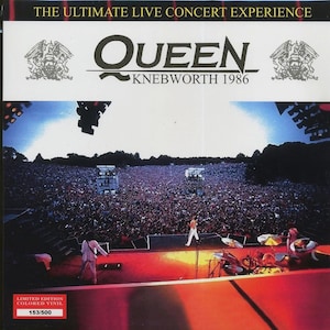 May include: Queen album cover with the text "Knebworth 1986." The image shows a live concert with a large crowd and the band performing on stage. The album is a limited edition coloured vinyl, numbered 153/500.