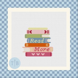 May include: A cross-stitch pattern on white Aida fabric featuring a stack of six colorful books. The blue book has the word Read stitched in white, and the light pink book has the word More stitched in dark pink. The design includes hearts and lines.