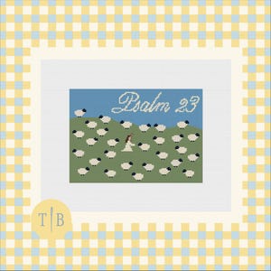 May include: A cross-stitch pattern featuring a green field with numerous white sheep with black faces and legs. A central figure stands among the sheep under a blue sky with the white text Psalm 23. The design is framed by a yellow and blue gingham border.