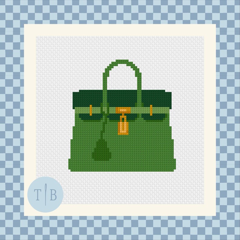 May include: A cross-stitch pattern featuring a green handbag with a darker green top flap, a single handle, and a gold-colored metallic clasp and lock detail. The design is centered on a white grid fabric background with a small circular logo in the corner.