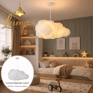 May include: A white cloud-shaped pendant light hangs from the ceiling in a child's bedroom. The light fixture is illuminated, casting a soft glow. The room features a bed, artwork, and a rug. Text on the image reads "CLOUD PENDANT LIGHT" and "Soft Glow - Dreamy Atmosphere."