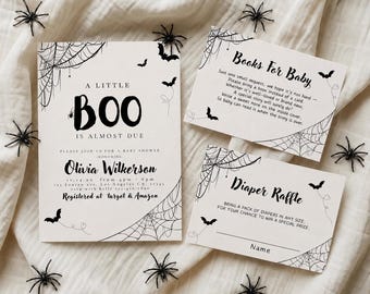 May include: A white baby shower invitation set featuring black spiderweb illustrations, bats, and the text A LITTLE BOO IS ALMOST DUE, Books For Baby, and Diaper Raffle. The invitation includes details for Olivia Wilkerson, date, time, and registry.