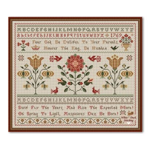 May include: Cross-stitch sampler with a brown frame. The design features floral and bird motifs, with text including the alphabet and phrases like "Fear God, Be Dutiful." The color palette includes red, green, and tan.