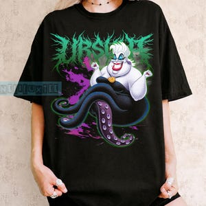 May include: A white ceramic mug with a black handle and the text "But First, Coffee" in a handwritten style. The mug is on a white surface. The mug is approximately 4 inches tall.