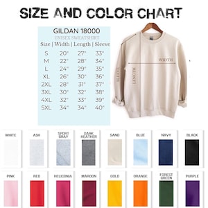 May include: A size and color chart for a Gildan 18000 unisex sweatshirt. The chart displays measurements in inches for sizes S to 5XL, along with a color palette including white, black, navy, and more. A beige sweatshirt is shown.