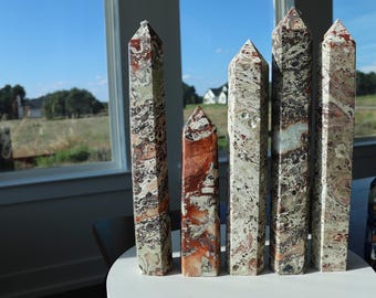Money Agate Tower – Leopard Skin Jasper Obelisk with Orange Agate Rosettes